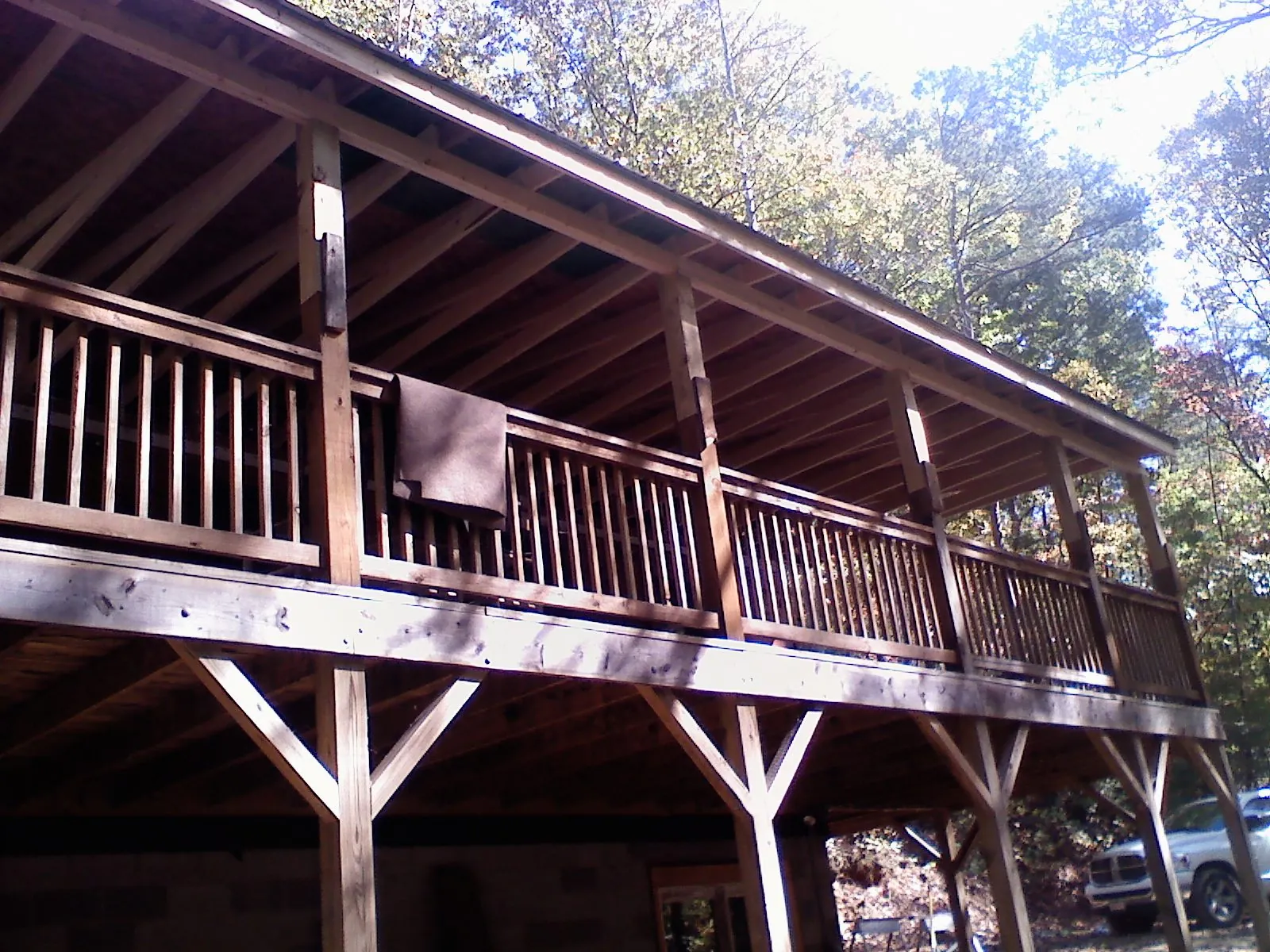 Timber framing under a new elevated porch and deck — Roof Leak Repair in Carpenter by Roofing Brothers